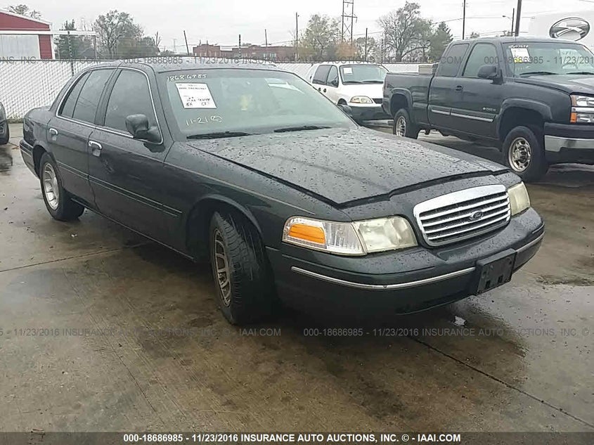 2FAFP74W7XX179460 1999 Ford Crown Victoria Lx auction photo 1
