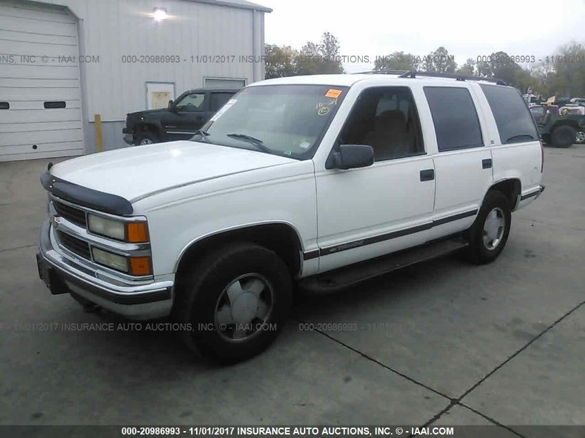 1999 Chevrolet Tahoe K1500 VIN: 1GNEK13RXXJ409277 Lot: 20986993