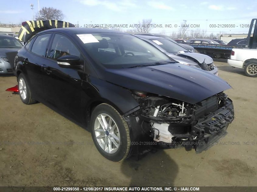 2015 Ford Focus Se VIN: 1FADP3F21FL383872 Lot: 21299350