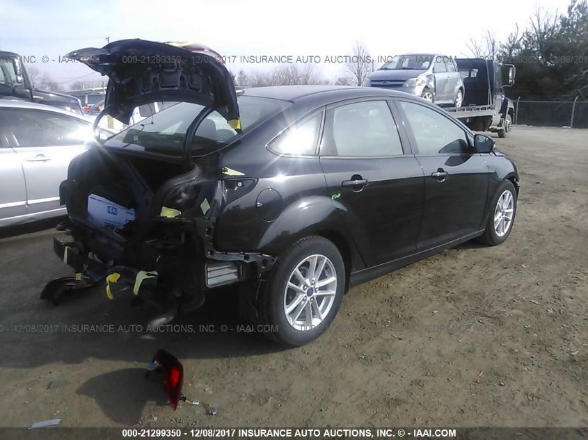 2015 Ford Focus Se VIN: 1FADP3F21FL383872 Lot: 21299350