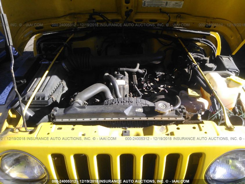 2000 Jeep Wrangler Sport VIN: 1J4FA49S9YP736984 Lot: 24005312