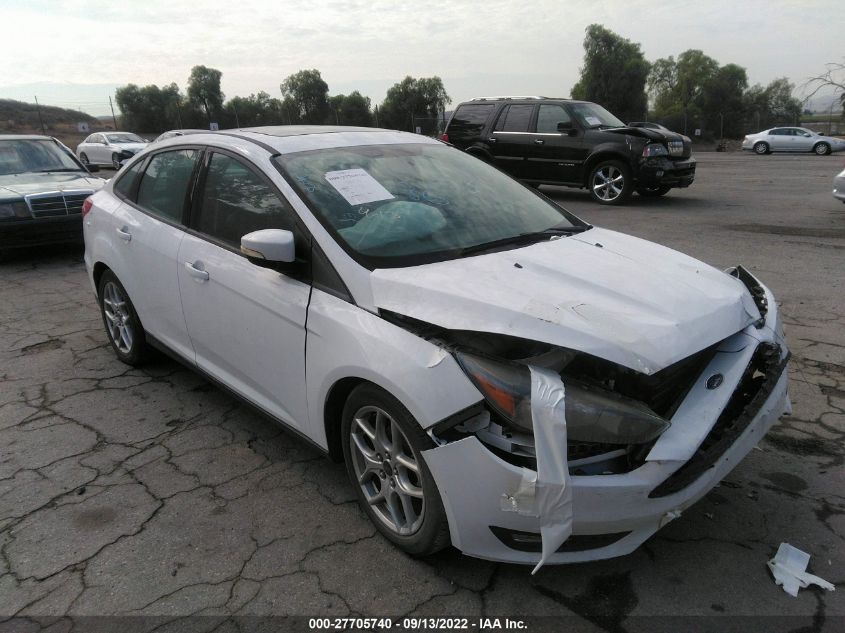 2015 Ford Focus Se VIN: 1FADP3F20FL348689 Lot: 27705740