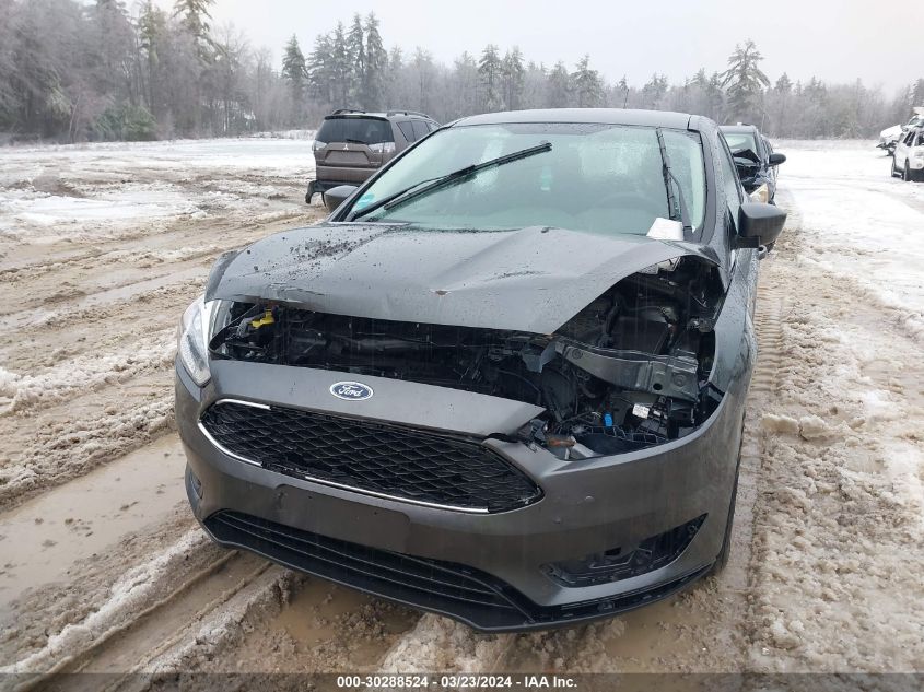 2018 Ford Focus Se VIN: 1FADP3K21JL297623 Lot: 30288524