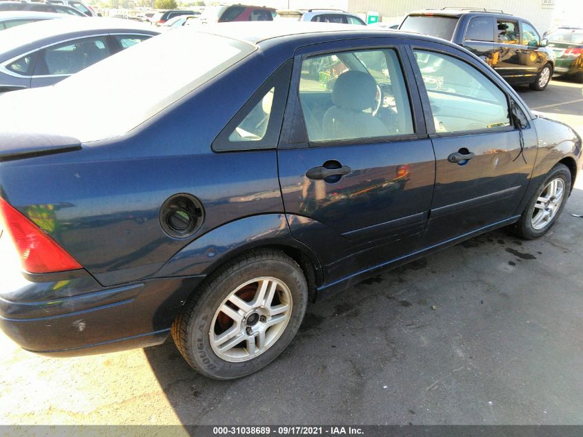 2001 Ford Focus Se Street Edition/Se VIN: 1FAFP34331W104952 Lot: 31038689