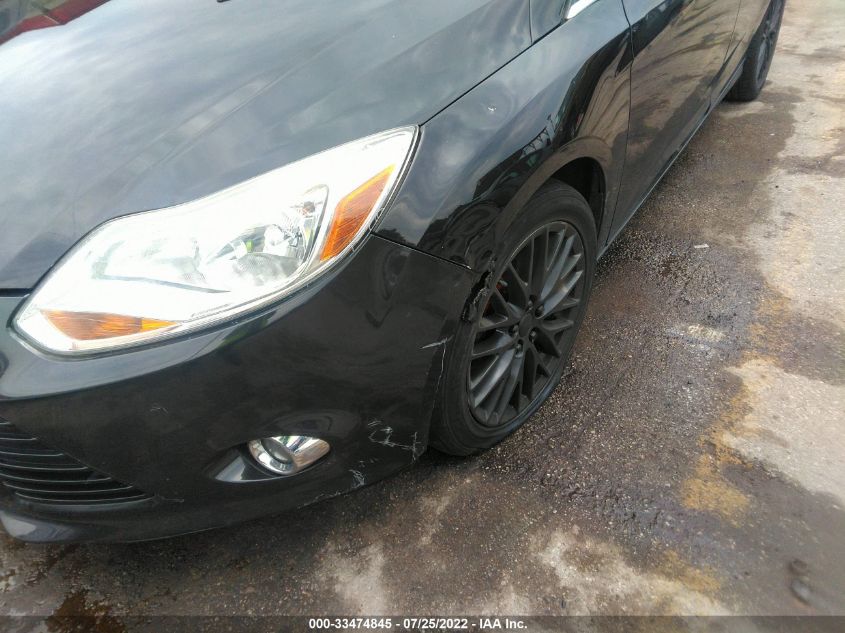 1FAHP3H29CL331447 2012 Ford Focus Sel