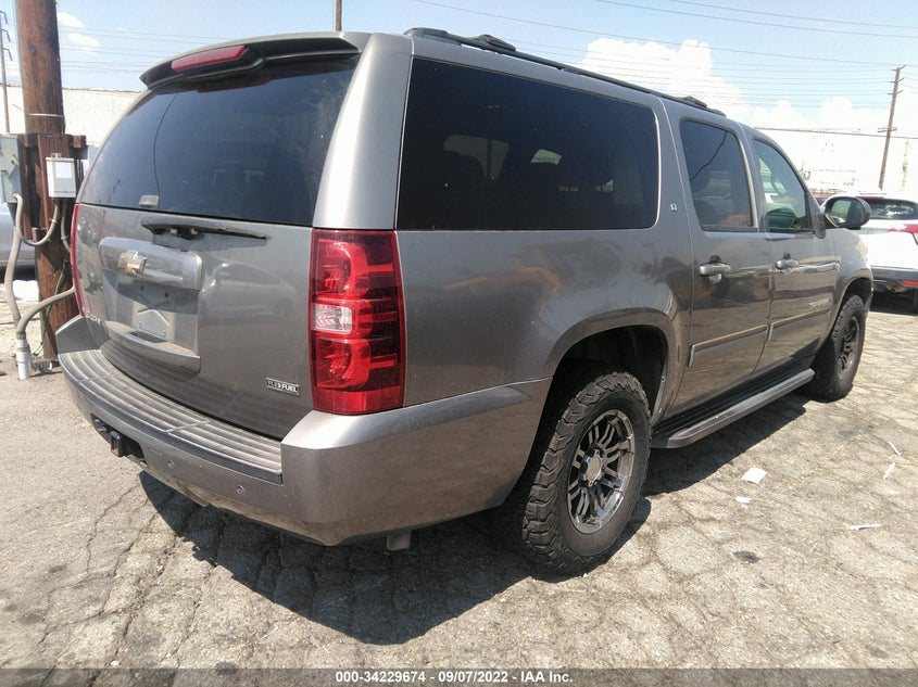 2009 CHEVROLET SUBURBAN VIN: 1GNFC260X9R273998