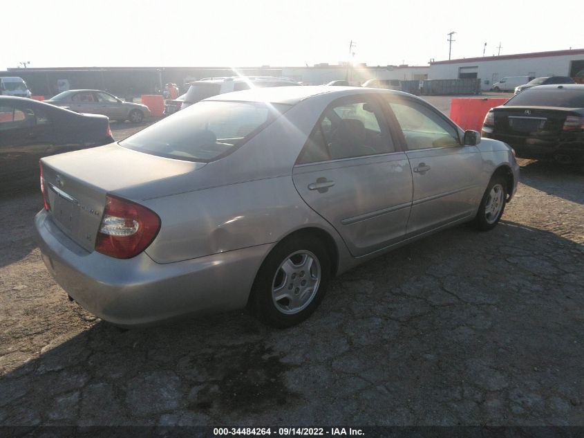 2002 Toyota Camry Le VIN: 4T1BF32K82U002559 Lot: 34484264