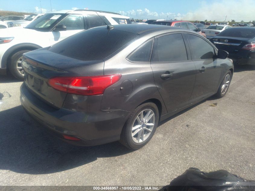 2018 Ford Focus Se VIN: 1FADP3F29JL256568 Lot: 34566957