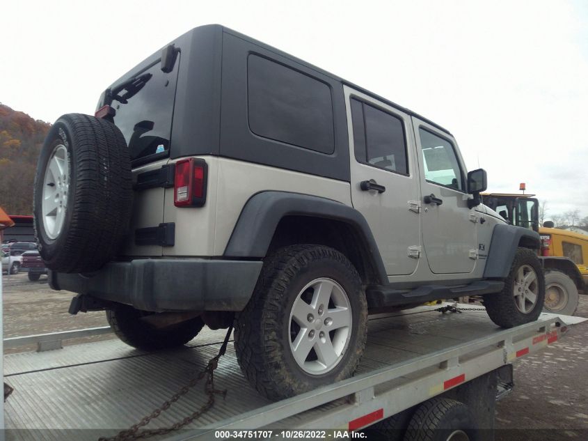 2007 Jeep Wrangler Unlimited X VIN: 1J4GA39117L106064 Lot: 34751707