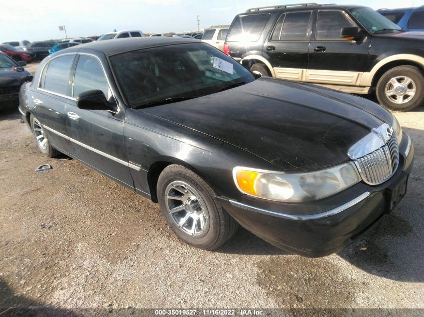 1999 Lincoln Town Car Signature VIN: 1LNHM82W8XY645557 Lot: 35019527