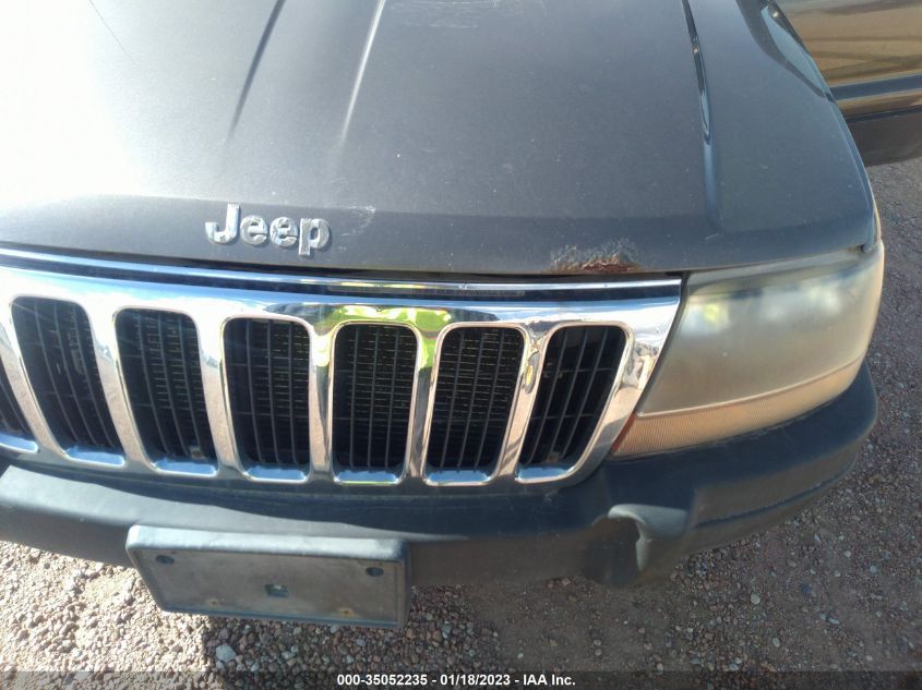 2003 Jeep Grand Cherokee Laredo VIN: 1J4GW48N13C611138 Lot: 35052235