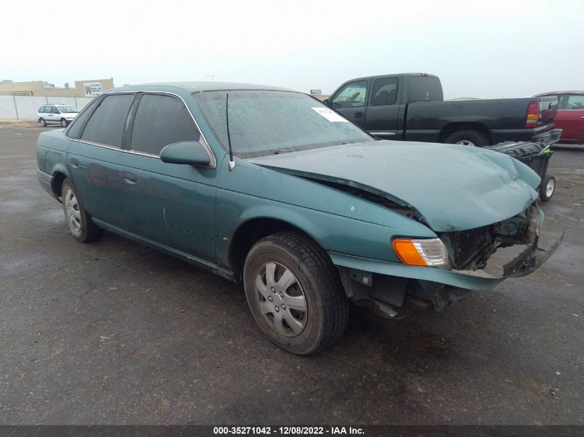 1992 Ford Taurus L VIN: 1FACP50U7NG283199 Lot: 40955228