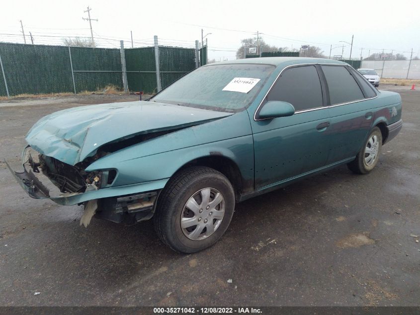 1992 Ford Taurus L VIN: 1FACP50U7NG283199 Lot: 40955228