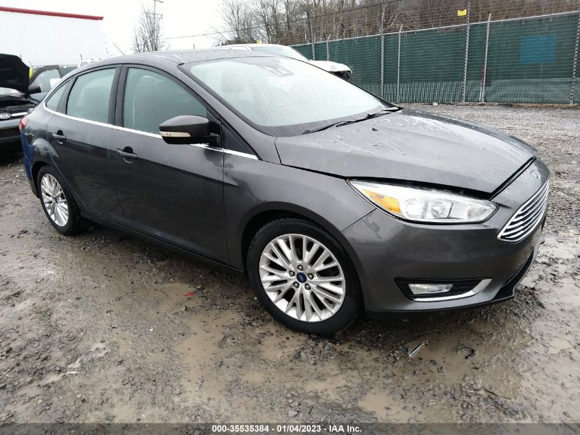 2015 Ford Focus Titanium VIN: 1FADP3J21FL200963 Lot: 35535384