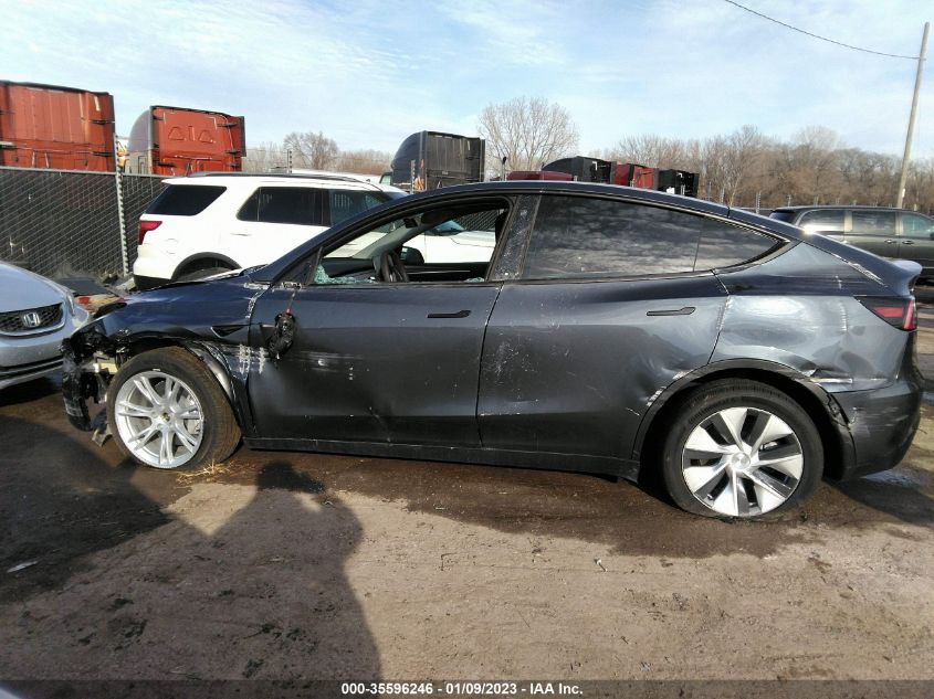 2023 Tesla Model Y Awd/Long Range Dual Motor All-Wheel Drive VIN: 7SAYGAEE4PF595409 Lot: 35596246