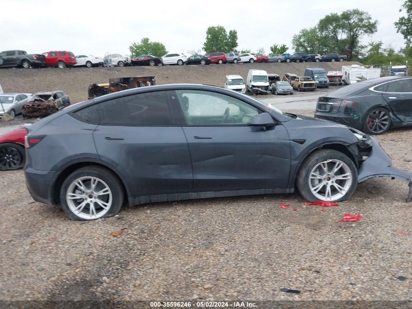 2023 Tesla Model Y Awd/Long Range Dual Motor All-Wheel Drive VIN: 7SAYGAEE4PF595409 Lot: 35596246