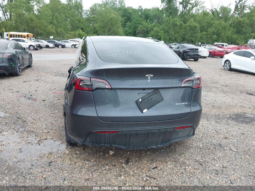 2023 Tesla Model Y Awd/Long Range Dual Motor All-Wheel Drive VIN: 7SAYGAEE4PF595409 Lot: 35596246