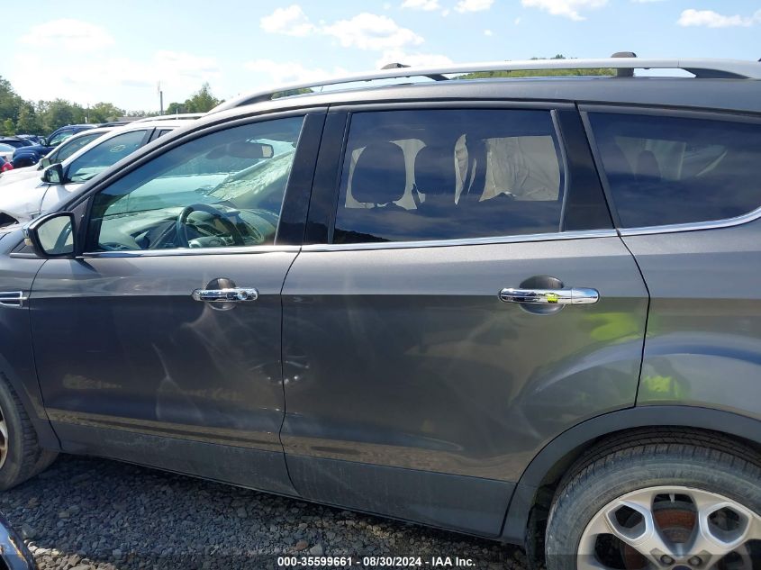 2014 Ford Escape Titanium VIN: 1FMCU9J92EUB76773 Lot: 35599661