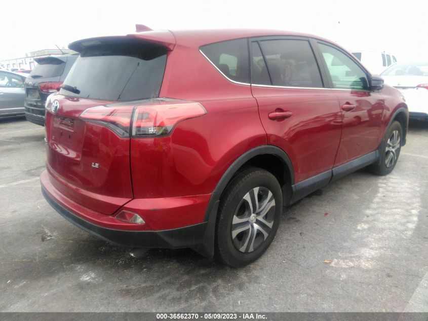 2T3ZFREV9JW494077 2018 Toyota Rav4 Le