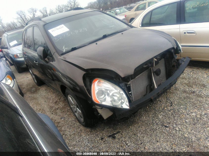 2009 Kia Rondo Lx VIN: KNAFG528997230613 Lot: 36565346