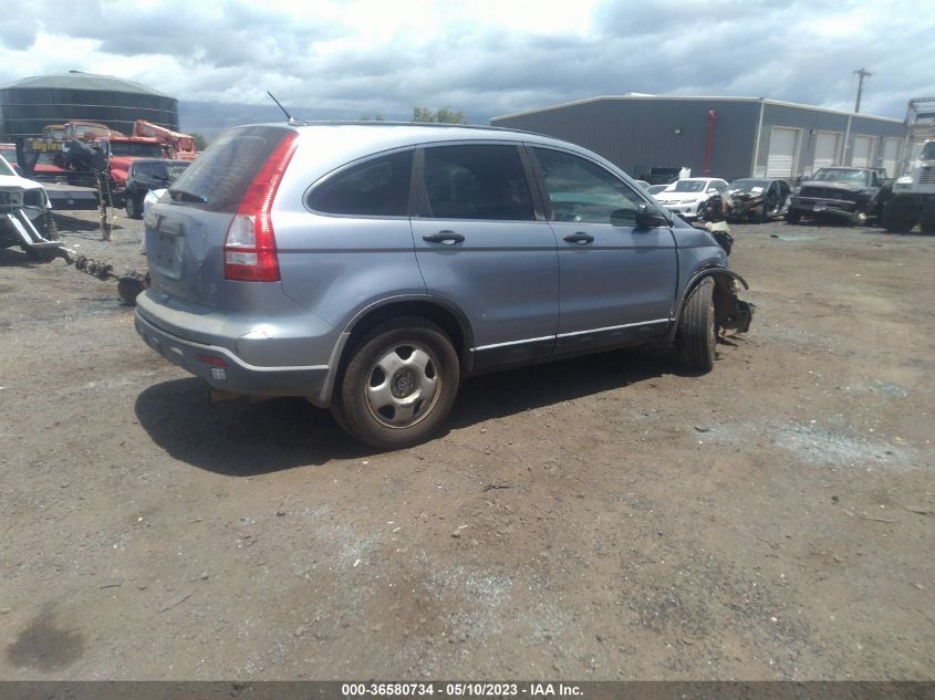 2007 Honda Cr-V Lx VIN: JHLRE38387C074559 Lot: 36580734