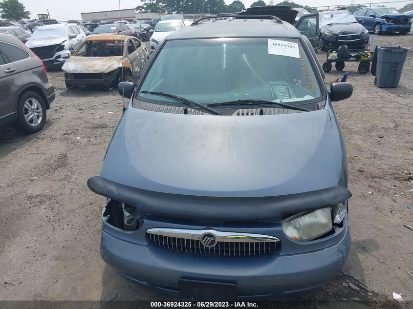 2000 Mercury Villager VIN: 4M2XV11TXYDJ04069 Lot: 36924325