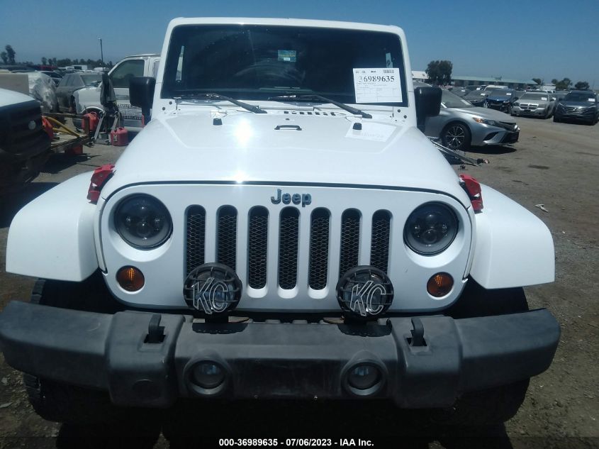 2011 Jeep Wrangler Unlimited Sahara VIN: 1J4BA5H14BL632804 Lot: 36989635