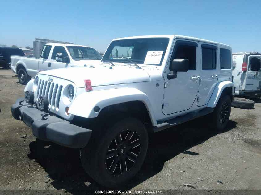 2011 Jeep Wrangler Unlimited Sahara VIN: 1J4BA5H14BL632804 Lot: 36989635