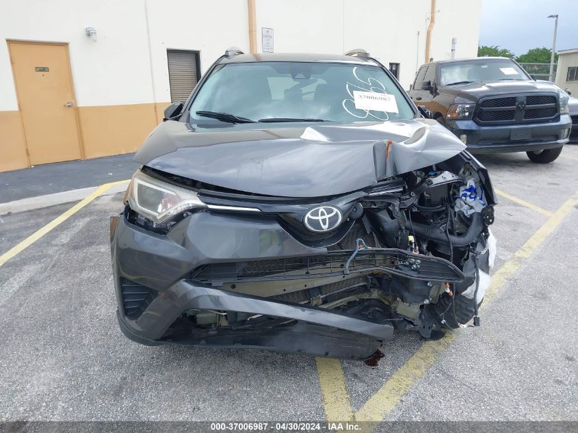 2018 Toyota Rav4 Le VIN: 2T3ZFREV8JW478565 Lot: 37006987