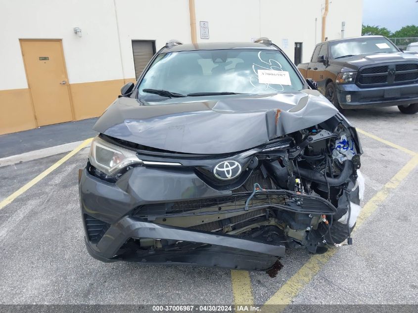 2018 Toyota Rav4 Le VIN: 2T3ZFREV8JW478565 Lot: 37006987