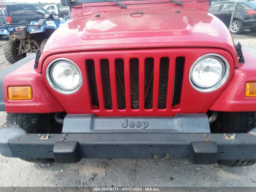 2002 Jeep Wrangler X VIN: 1J4FA39S62P769992 Lot: 37076171