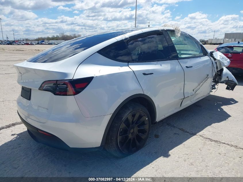 2023 Tesla Model Y VIN: 7SAYGDEE6PF638536 Lot: 37082997