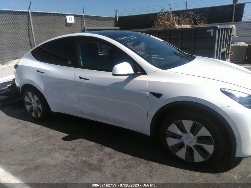 2023 Tesla Model Y Awd/Long Range Dual Motor All-Wheel Drive VIN: 7SAYGAEE8PF601230 Lot: 37162759