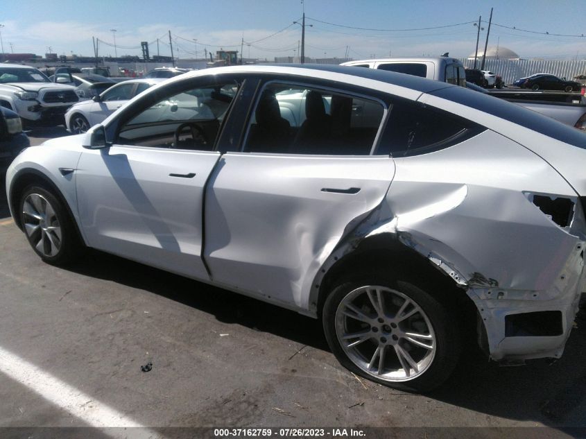 2023 Tesla Model Y Awd/Long Range Dual Motor All-Wheel Drive VIN: 7SAYGAEE8PF601230 Lot: 37162759