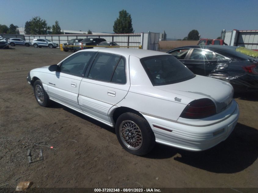 1994 Pontiac Grand Am Se VIN: 1G2NE55M1RC775469 Lot: 37202348