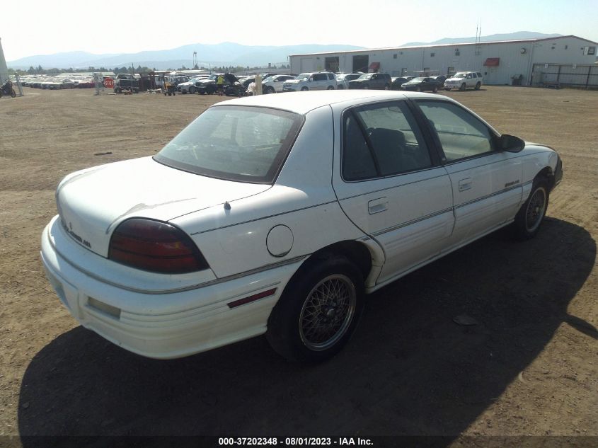 1994 Pontiac Grand Am Se VIN: 1G2NE55M1RC775469 Lot: 37202348