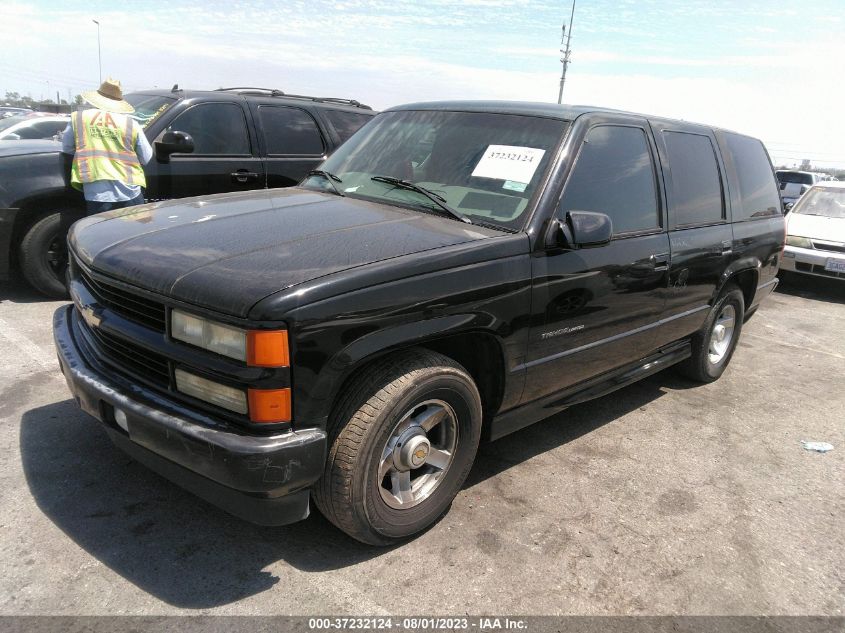 2000 Chevrolet Tahoe Limited VIN: 1GNEC13R1YR166555 Lot: 37232124