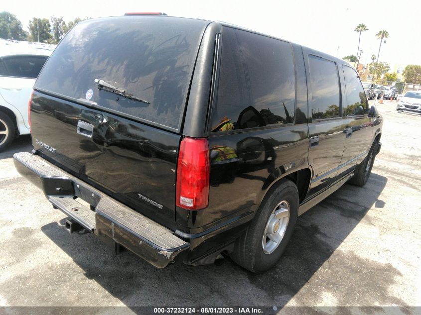 2000 Chevrolet Tahoe Limited VIN: 1GNEC13R1YR166555 Lot: 37232124