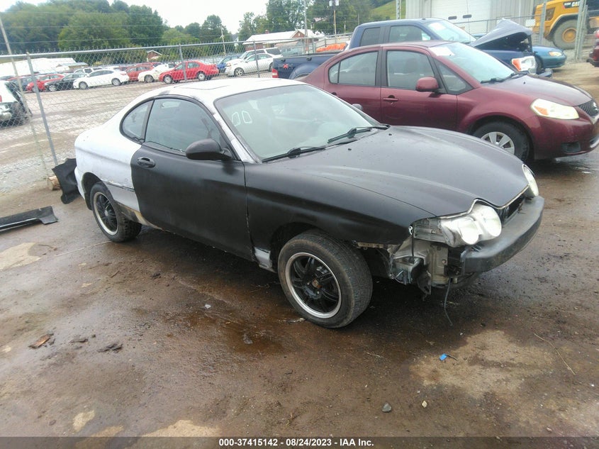 2001 Hyundai Tiburon Leather/Base Pkg 1 & 2 (A4)/Base Pkg 1 & 2 (M5) VIN: KMHJG25F21U244201 Lot: 37415142