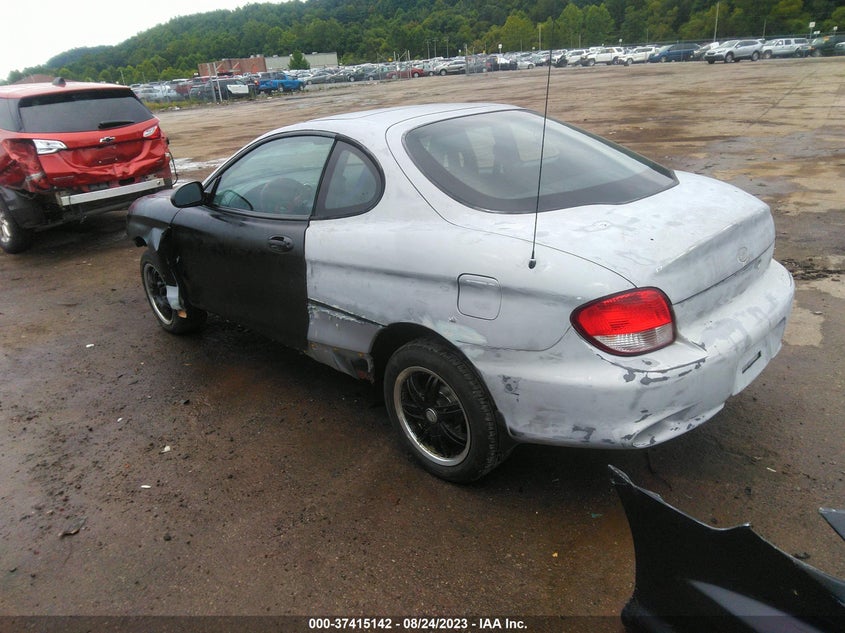 2001 Hyundai Tiburon Leather/Base Pkg 1 & 2 (A4)/Base Pkg 1 & 2 (M5) VIN: KMHJG25F21U244201 Lot: 37415142
