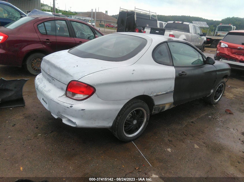 2001 Hyundai Tiburon Leather/Base Pkg 1 & 2 (A4)/Base Pkg 1 & 2 (M5) VIN: KMHJG25F21U244201 Lot: 37415142