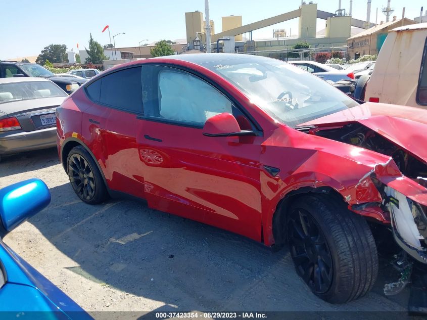 2022 Tesla Model Y Long Range Dual Motor All-Wheel Drive VIN: 7SAYGAEE7NF521138 Lot: 37423354