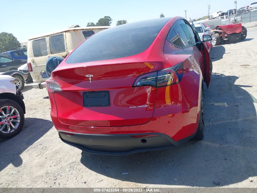 2022 Tesla Model Y Long Range Dual Motor All-Wheel Drive VIN: 7SAYGAEE7NF521138 Lot: 37423354