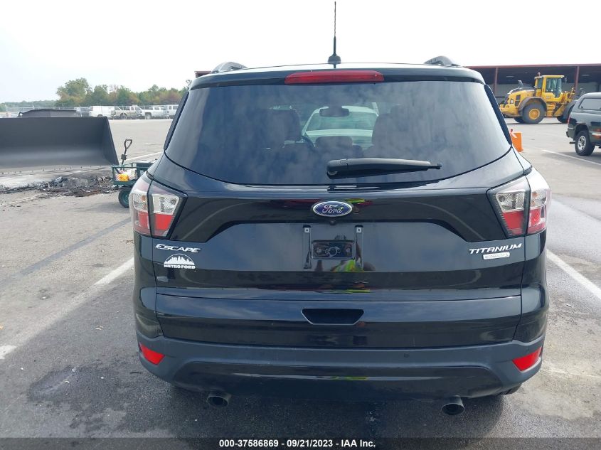 2017 Ford Escape Titanium VIN: 1FMCU0J90HUF10332 Lot: 37586869