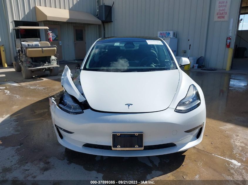 2022 Tesla Model 3 Long Range Dual Motor All-Wheel Drive VIN: 5YJ3E1EB1NF258647 Lot: 37599385