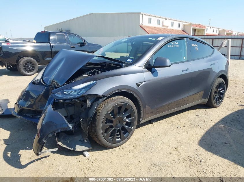 2023 Tesla Model Y Awd/Long Range Dual Motor All-Wheel Drive VIN: 7SAYGDEE5PA047384 Lot: 37601382