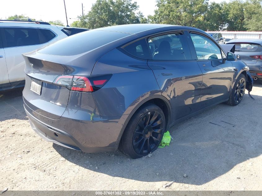 2023 Tesla Model Y Awd/Long Range Dual Motor All-Wheel Drive VIN: 7SAYGDEE5PA047384 Lot: 37601382