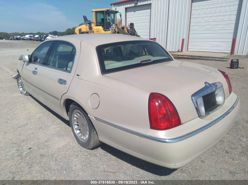 1999 Lincoln Town Car Cartier VIN: 1LNHM83W1XY710229 Lot: 37616535