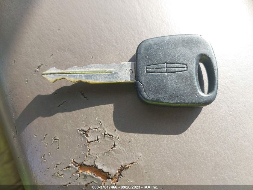 1998 Lincoln Continental VIN: 1LNFM97V0WY658251 Lot: 37617466