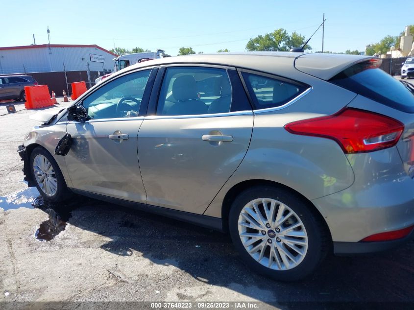 2016 Ford Focus Titanium VIN: 1FADP3N24GL321031 Lot: 37648223